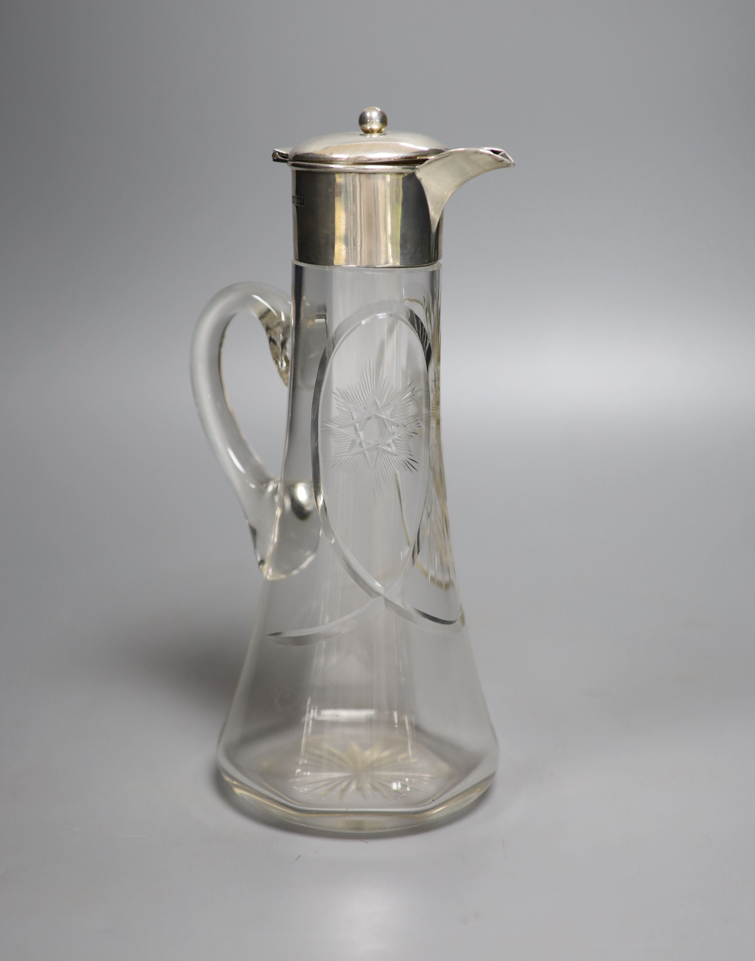 An Edwardian silver mounted glass claret jug, James Deakin & Sons, Sheffield, 1908, 26.2cm.